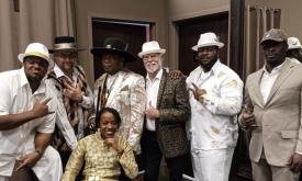 The Shaelyn Band standing together, smiling.