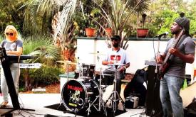 The band Chillakaya playing outside