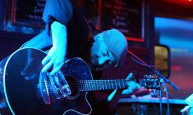 Amo Doyle performing onstage