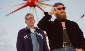 Bandmates from the Black Keys pose for fans. 