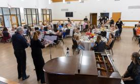 The orchestra performing in front of their guests
