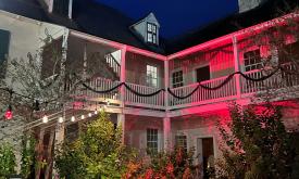 The Ximenez-Fatio House Museum lit for Women in Black