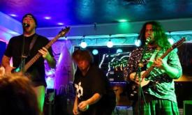 Metal band Zalongo onstage, performing