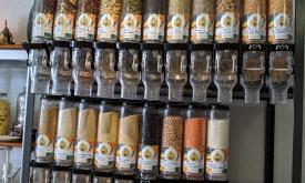 A display of nuts and dried beans from Peace In a Nutshell at Local Refillery in St. Augustine.