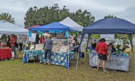 Booths featuring arts and crafts, and local environmental organizations can be found at Lullaby of the Rivers.
