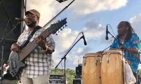 King Eddie and the Pili Pili Band performing outside in St. Augustine.