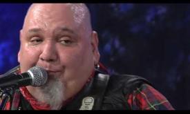 Popa Chubby sings the song titled "Sympathy For the Devil." 