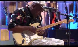 "Damn Right,I've Got the Blues" written and performed by Buddy Guy