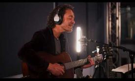 Amos Lee performs his song "With You" alongside classical musicians
