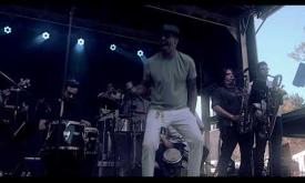 LPT performing "Se Me Perdió" live from a stage in Jacksonville