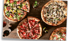 View of different pizzas offered by Mellow Mushroom