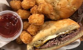 Hot sandwich and tots from Cafe Ybor! Food Bus in St. Augustine, Fl 