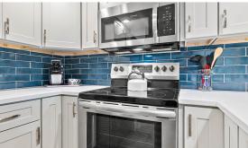 Recent updates at the Ocean & Racquet include stainless steel appliances.