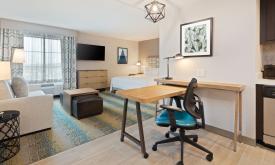 Rooms feature an eating/desk area and small kitchen at Homewood Suites in St. Augustine.