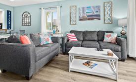 Comfortable living areas in coastal style will make guests feel right at home.
