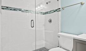 Recently updated amenities at Ocean & Racquet include sparkling clean shower enclosures.