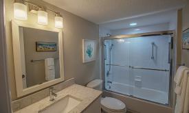 Ocean Villas bathroom with shower and tub 