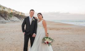 A Daniel Thompson Bridals bride and her groom on the beach in St. Augustine.