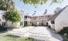 Outdoor wedding ceremony at Ximenez-Fatio House in St. Augustine, Florida. 