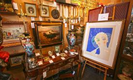 Find fine art and estate jewelry at this St. Augustine shop. Signed Erte lithograph.