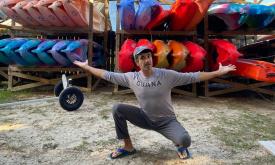 Ben with some of the kayaks used by Geo Trippin' Adventure Co. in St. Augustine.