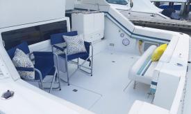 The afterdeck of the Island Queen offers comfortable seating just a few feet above the water. 