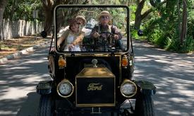 Pastime Tours's electrically-powered "Model-T" taking a ride along picturesque Magnolia Avenue in St. Augustine.