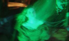 A ghost in green, at Ripley's Believe It or Not! Haunted Castle Tour in St. Augustine.