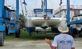 Lifting and moving a catamaran at St. Augustine Marine Center on the San Sebastian River in St. Augustine.