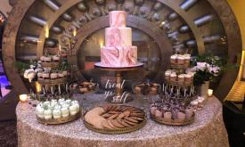 Dessert table created by Sweet Weddings Cake Designs in St. Augustine, FL.