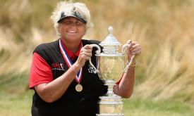 female golfer with trophy 