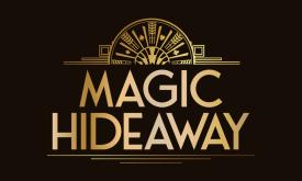 The logo for Magic Hideaway has a gold design and lettering over a black background