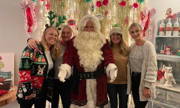Santa and four tour guests for HoHoHo Tasting Tours