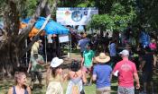 Happy craft brew enthusiasts enjoying the Brewers' Fest at the Fountain of Youth in St. Augustine.
