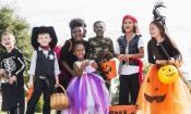 A group of friends and family enjoying the Halloween Bash in costume.