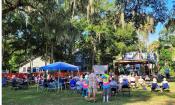 Concert-goers enjoying the Blues at Saint Benedict the Moor's Blues Fest in St. Augustine.