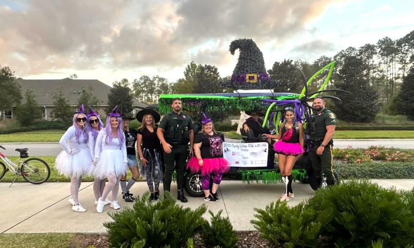 Women dressed as witches for the charity witch bike ride in Nocatee in October