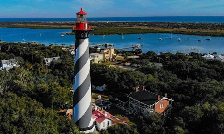 The St. Augustine Lighthouse with and park overlooking Salt Run and the Atlantic Ocean