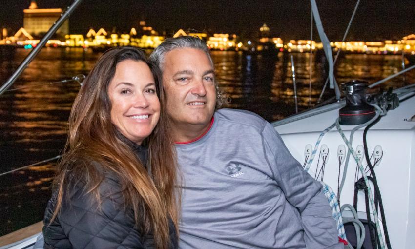 A couple aboard a yacht from St. Augustine Sailing, enjoying Nights of Lights in St. Augustine.