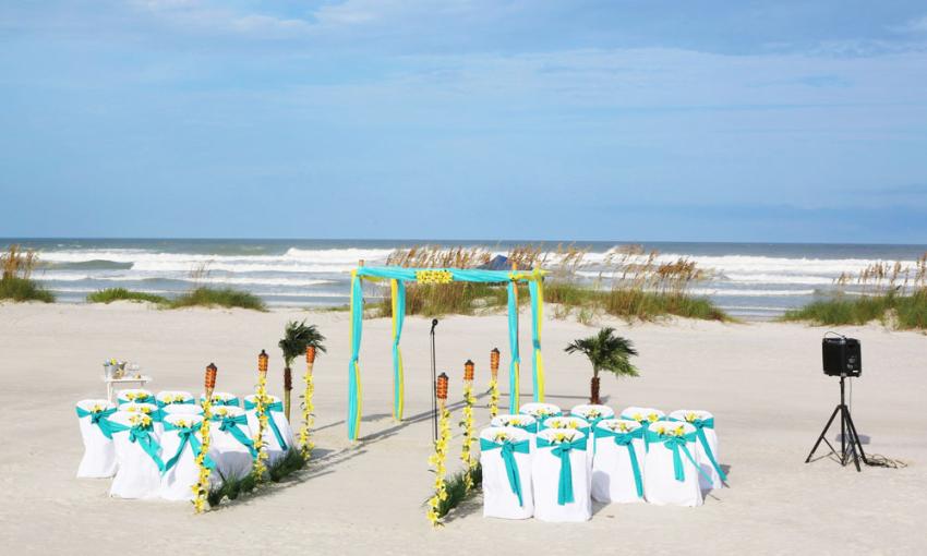 A beachfront ceremony offers pristine views of the ocean in St. Augustine.