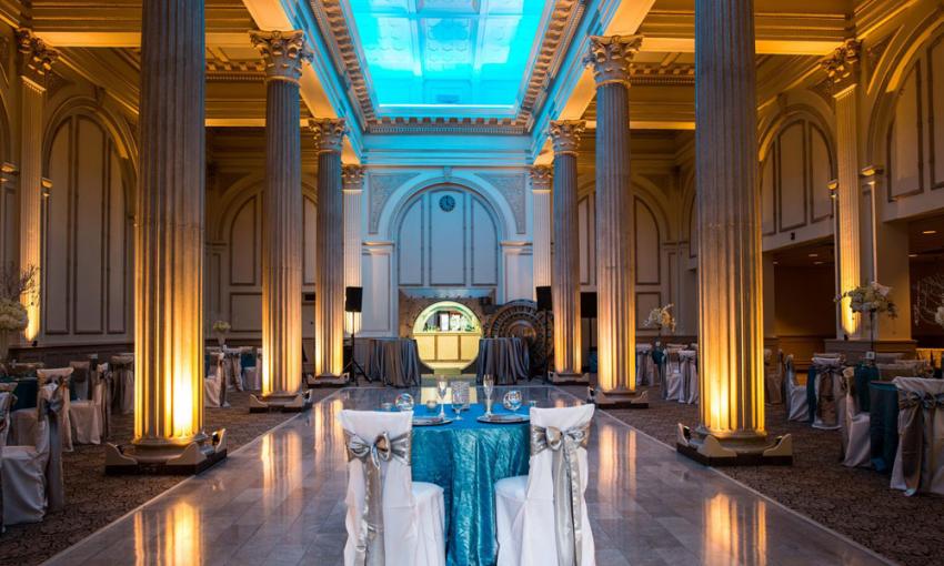 The Treasury at the Plaza, arranged for a wedding with blue accents 